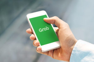 Grab-give-points-to-passenger